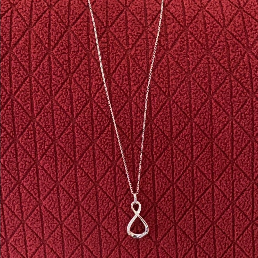 Silver necklace with faux diamond pendant